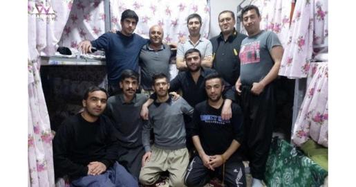 Iman Abdi is the third person seated from the right in the row. Ahmad Tamouei is the third person standing from the right side of the row in Urmia Darya Prison