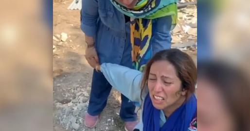 A Baha’i woman in Roshankouh village cries as her home is destroyed