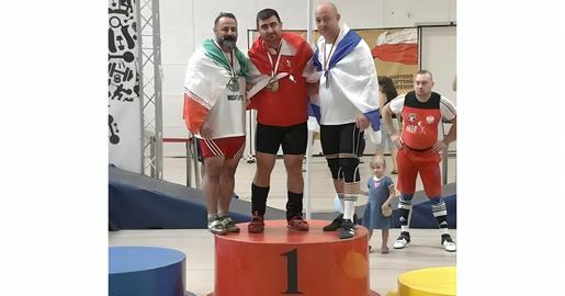 Langeroodi has been handed a lifetime ban from competing in both domestic and international competitions for standing next to Svirsky on the podium at the World Senior Weightlifting Championship in Poland