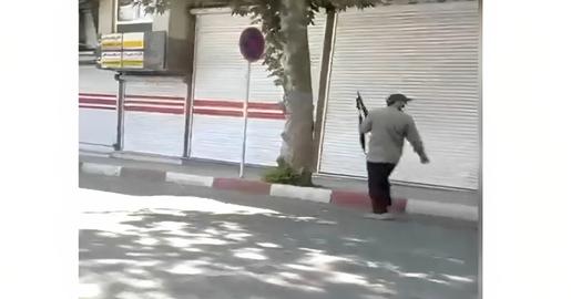 A video shows a plainclothes gunman, who eyewitnesses said shot and killed Yahya Rahimi