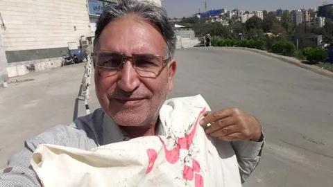 Iranian Activist Mohammad Nourizad Attacked in Evin Prison
