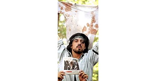 Ahmad Batebi, a young photographer whose picture with his friend's bloody shirt became a symbol of the Iranian student uprising in July 1999, previously said that he heard interrogators in solitary confinement discussing a prisoner named Zeynali
