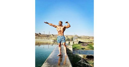 Bodybuilding champion Reza Olfati was arrested about three weeks after he sustained injuries during a protest rally in Kermanshah.