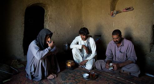 Carriers at the border zero point after delivering fuel and receiving payment in Pakistan
