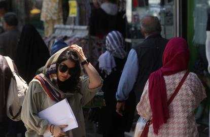 The Islamic Republic's authorities have launched a system to connect business CCTV cameras to the police to crack down on women defying the requirement to wear a headscarf