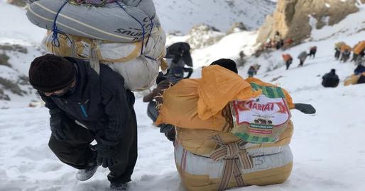 Kolbars are porters who haul goods on their backs and feet over long distances across Iran's borders, mainly around the impoverished, mountainous Kurdish areas adjacent to Iraq