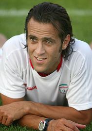 Iranian footballer Ali Karimi has asked members of Iran's national football team to "choose the right side of history" after a government official suggested on Sunday that athletes who refuse to sing the national anthem should be cut from their teams