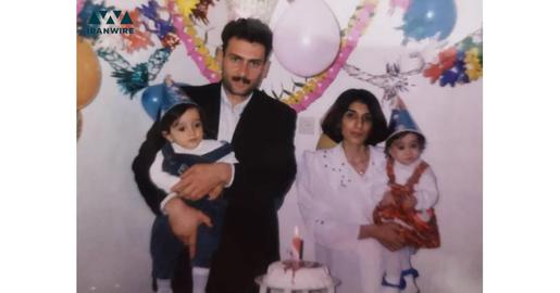 Reza and her twin sister, Narges, with their parents.