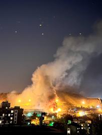 The Iranian authorities claim there was a "riot" in Evin on Saturday night and a fire was started by "thugs" and "troublemakers."