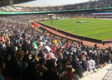 Thousands of schoolchildren attended a publicity event at Tehran's Azadi Stadium on May 27, on the same day as young people were being pulled from the rubble of the Metropol collapse in Abadan