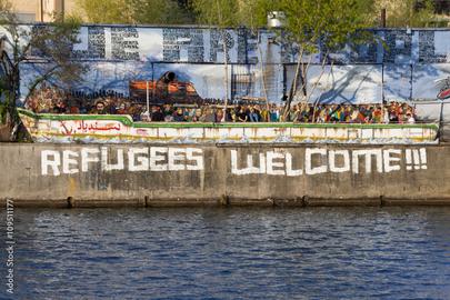 گرافیتی خوش‌آمدگویی به پناهجویان در برلین