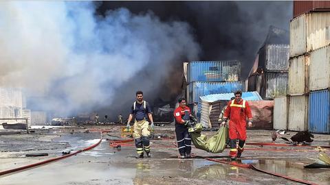 'Not Even a Shoe Left': Iran's Missing Migrant Workers After Port Disaster