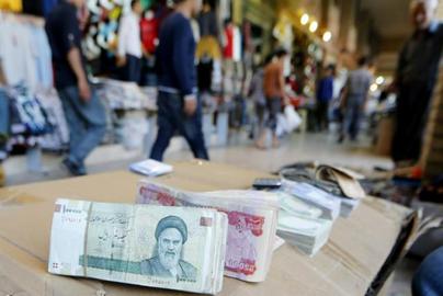 Iran’s currency hit a record low of 1,040,000 rials to the US dollar on Tuesday