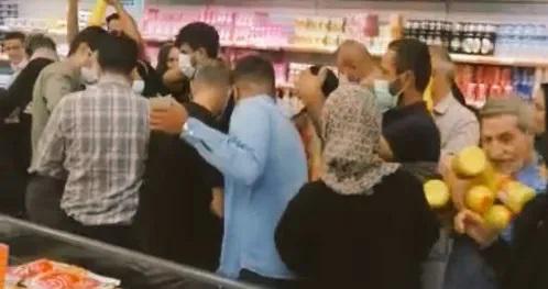 A video purporting to show scuffles over cooking oil at the Etka shopping center in Tehran on Thursday