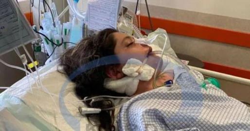 A photo of the young woman in hospital shows bleeding and discoloration around her ear which doctors told IranWire was consistent with a blow to the head