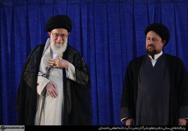 Ayatollah Khamenei with Hassan Khomeini at a commemoration for his grandfather, Ayatollah Khomeini. The Supreme Leader made his announcement about nuclear enrichment during the event