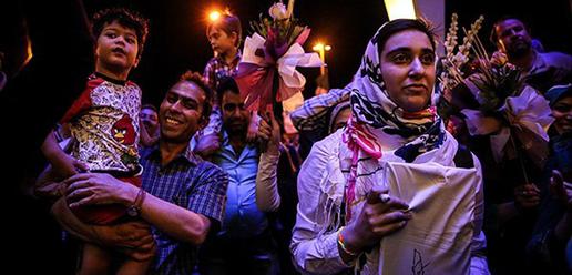 Volleyball team welcomed home by adoring fans