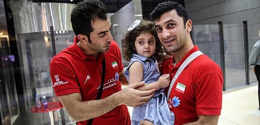 Volleyball team welcomed home by adoring fans