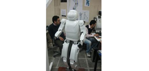 Researchers at Tehran University with humanoid robot Surena 2
