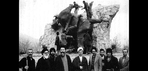 Bani Sadr, Hashemi Rafsanjani, Ayatollah Beheshti and Ayatollah Taleghani pose in front of a toppled statue of the Shah