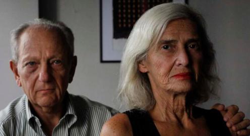Luis pictured with his wife Ana Maria Blugerman, who survived the blast only because she was in an office at the back of the building at the time