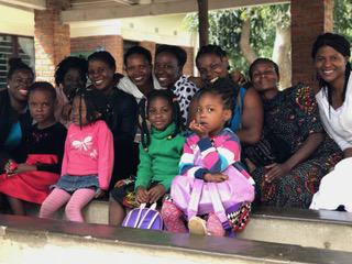 Teachers and children at Bambinos Nursery School