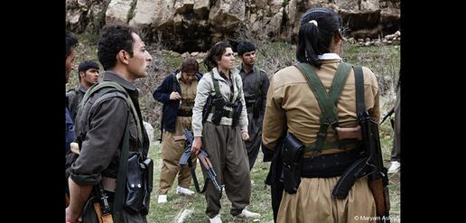 Peshmerga soldiers try out their weapons after recently completing their military training.