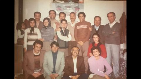 Baha'i prisoners meeting with families. Dr. Firouz Naeimi is second from right