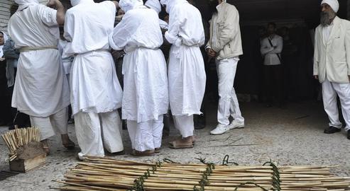 The Mandaean dead are bathed in the river and wrapped in palm fibres for burial