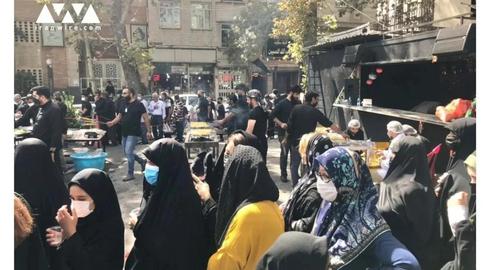 Mourners Queue for Votive Chicken in Tehran