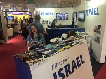 An Israeli film stall is located just opposite an Iranian one at the Cannes Film Market