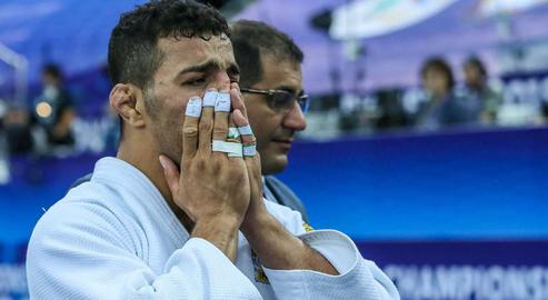 Iranian judoka Saeid Mollaei was forced to forfeit world championship to avoid competing against an Israeli athlete