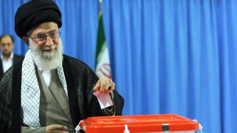 Ayatollah Khamenei voting in the presidential election, 2013. At the beginning of Rouhani's presidency, the Leader appeared to have changed his hard stance against nuclear talks