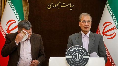 Ali Rabiei, a spokesperson for the government, and Iraj Harirchi, the Deputy Health Minister, at a press conference on February 24