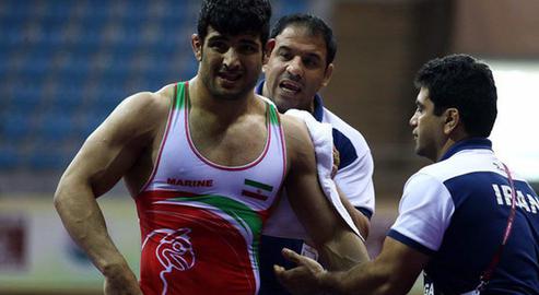 Ali Karimi was forced to lose to an Israeli opponent — and now several Iranian wrestlers attending championships in Kazakhstan may have to do the same