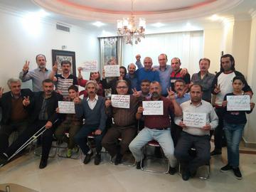 Workers in Tehran showed their support for striking workers in Khuzestan