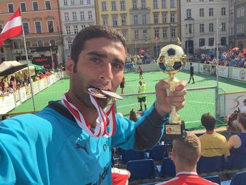 After settling in Austria, Afshar became the goalkeeper for the national futsal team