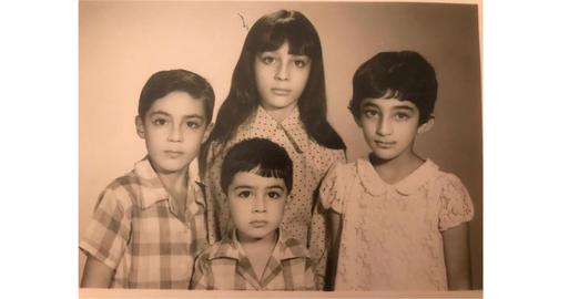 Siamak, Nazila, Nina and Babak Tobaei, pictured together as children in Tehran
