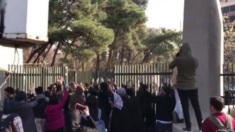 Protesting students at Tehran University were beaten after they shouted anti-government slogans