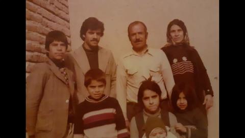 Yousef Ilkhichi Moghaddam (second from right, top row) with his family