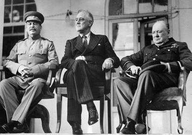 The picture was a homage to iconic photos of Joseph Stalin, Franklin Roosevelt and Winston Churchill at the 1943 Tehran Conference during World War II