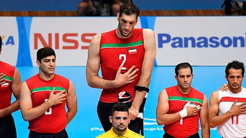 Morteza Mehrzad Selakjani, the world's second-tallest man and a wheelchair user, plays for Iran's national seated volleyball team