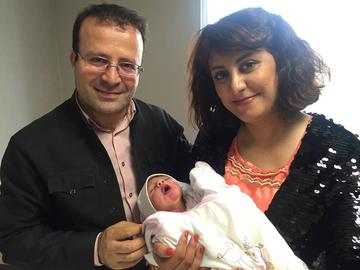 Kameel Ahmady and his wife Shafagh Rahmani with their son Alan in 2016