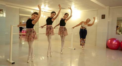 Ballet dance training in a private, underground classroom called Dancer