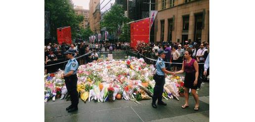 People lay flowers in Sydney