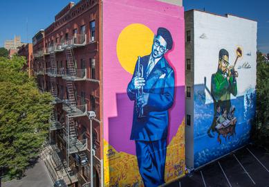 The double-mural collaboration is Education is Not a Crime's 20th and largest so far in New York City