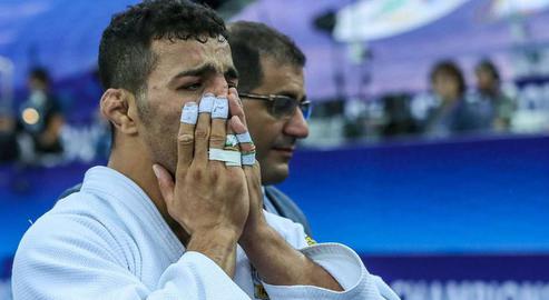 Iranian athletes have been blocked from competing with Israelis for four decades - an issue now subject to scrutiny by the International Olympic Committee