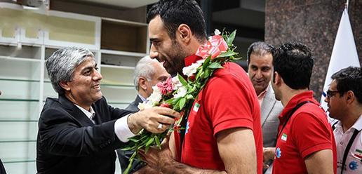 Volleyball team welcomed home by adoring fans