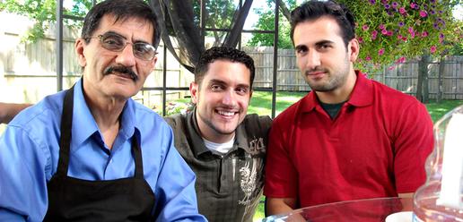 Amir with his father (left) and brother in law Ramy (middle) at a family barbecue