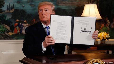 President Trump presents a signed memorandum reimposing nuclear sanctions on Iran, May 8, 2018